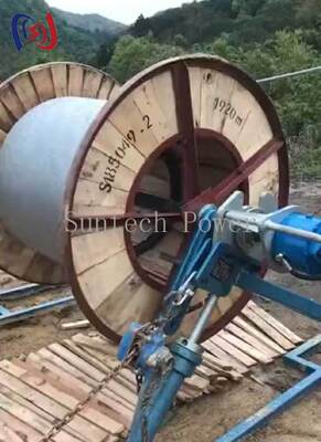 ขาตั้งม้วนสายไฟไฮดรอลิก รับน้ำหนักม้วนสูงสุด 5000-7000 กก. ความเร็วสูงสุด 45 รอบต่อนาที สำหรับการวางสายเหนือศีรษะ